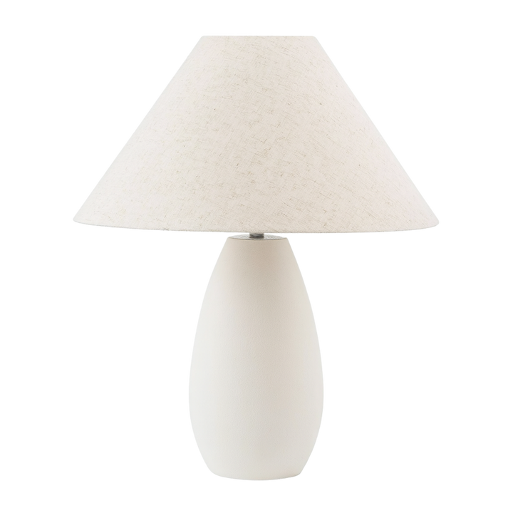 Bordslampa i keramik med tygskärm i ljus nyans, stilren design för skandinavisk inredning.