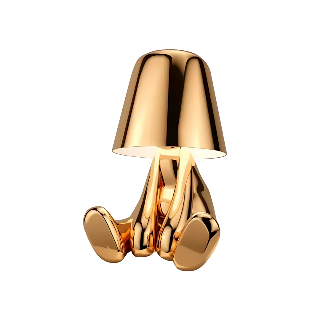 Bordslampa Thinker sittande i guld med konstnärlig form – exklusiv designbelysning för vardagsrum och sovrum
