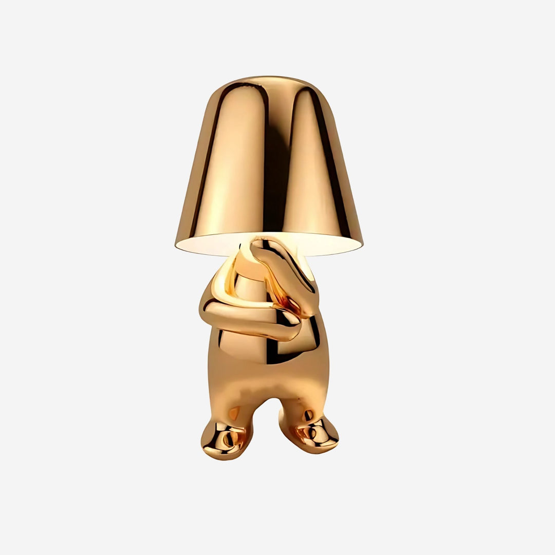 Bordslampa Thinker stående i guld med konstnärlig form – exklusiv designbelysning för vardagsrum och sovrum