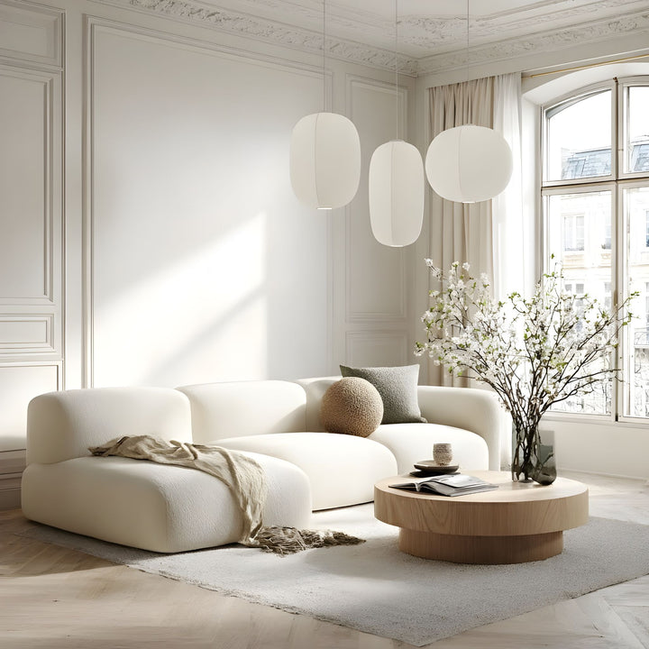 Taklampa Nebbia över soffgrupp i ljus och neutral miljö